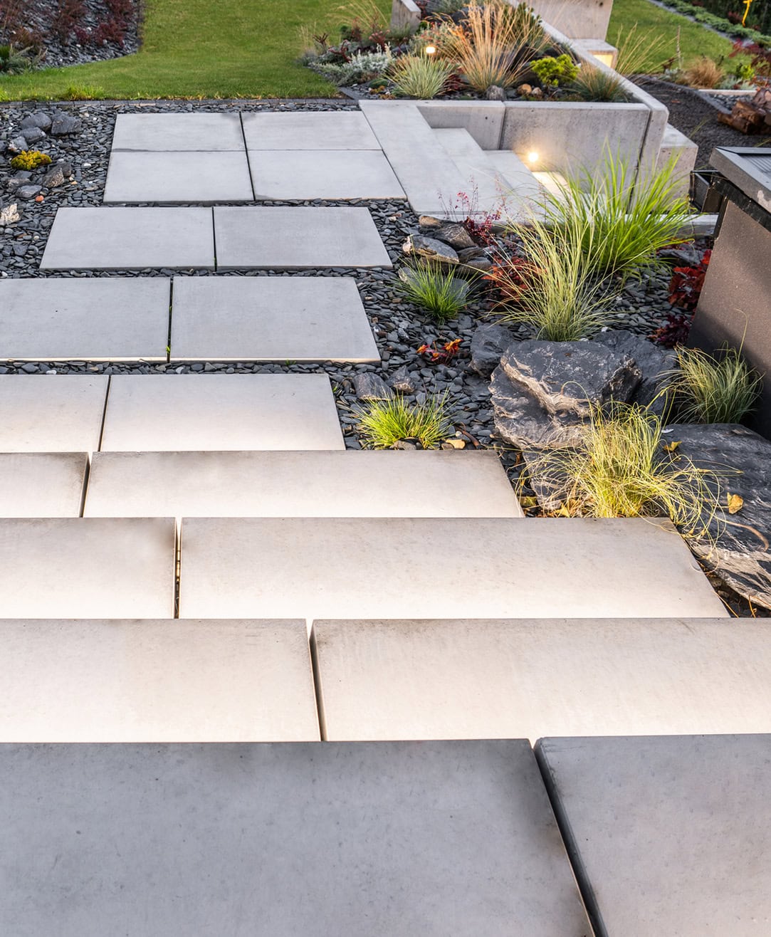 Stepping stone path with gravel planting in a contemporary garden, Surrey.