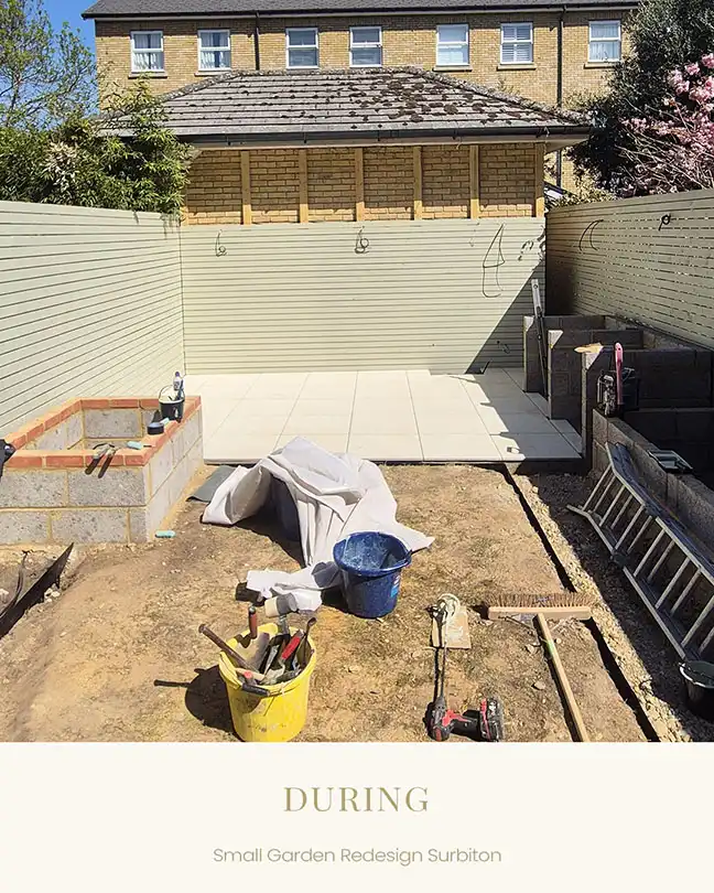 Small garden landscaping construction phase in Surrey with new patio and planters