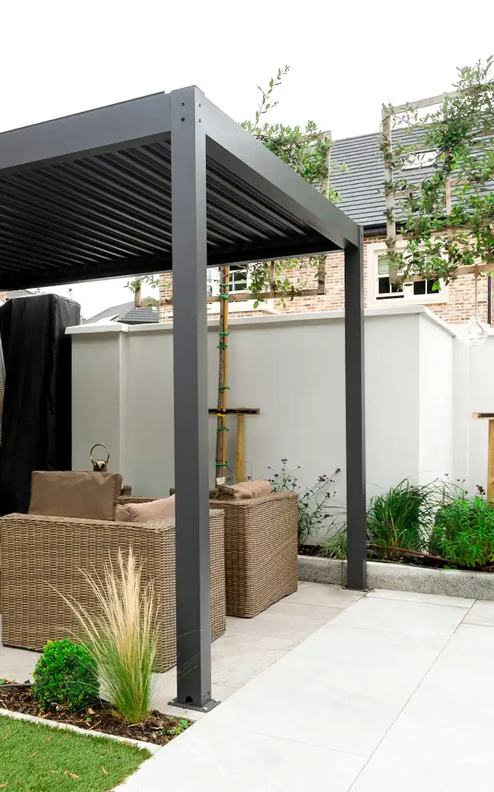 Modern low maintenance family garden in Epsom with pergola and patio